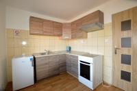 Kuchyň nebo kuchyňský kout v ubytování Apartmány - Školní
