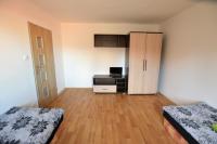 Postel nebo postele na pokoji v ubytování Apartmány - Školní