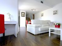 A seating area at Villa Mont Rodó con piscina y jardín privado - Pet Friendly
