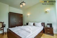 Posteľ alebo postele v izbe v ubytovaní Baltic Apartments - Bałtycka