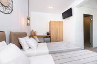 Telewizja i/lub zestaw kina domowego w obiekcie Kalisperis Hotel