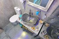 an overhead view of a bathroom with a sink and a toilet at Alisaxni Studios in Argassi