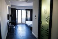 A bed or beds in a room at Bakour La Manga Splash