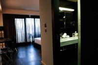 A bed or beds in a room at Bakour La Manga Splash