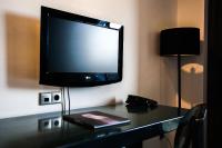 A television and/or entertainment centre at Bakour La Manga Splash