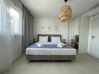 Posteľ alebo postele v izbe v ubytovaní Exclusive Seafront Suite with jacuzzi