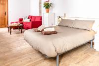 A bed or beds in a room at Casa Po