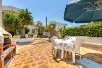 Patio lub wspólna przestrzeń na świeżym powietrzu w obiekcie Villa Stella Blu by BarbarHouse