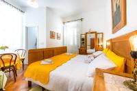 Postel nebo postele na pokoji v ubytování Villa Adriatica