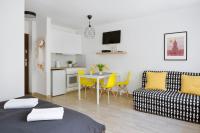 Kuchyň nebo kuchyňský kout v ubytování Flat Złote Tarasy Street