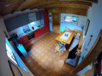 A kitchen or kitchenette at Casa Aurora -Altopiano di Pinè