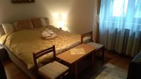 Łóżko lub łóżka w pokoju w obiekcie Balázs Apartman