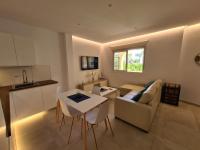Televízia a/alebo spoločenská miestnosť v ubytovaní Apartamento Puerto Marina Beach
