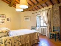 Łóżko lub łóżka w pokoju w obiekcie Holiday Home Bulleri by Interhome