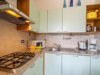 Kuchyň nebo kuchyňský kout v ubytování Holiday Home Residenza Agrifoglio-12 by Interhome