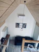 Televízia a/alebo spoločenská miestnosť v ubytovaní Domek letniskowy Sunny House , Nocleg Zator Energylandia
