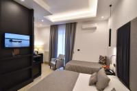 A bed or beds in a room at Hotel Palma