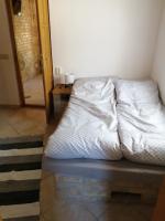 Posteľ alebo postele v izbe v ubytovaní Lisztes Apartman (medencés, nádfedeles, Zamárdi)