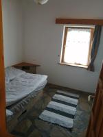 Posteľ alebo postele v izbe v ubytovaní Lisztes Apartman (medencés, nádfedeles, Zamárdi)
