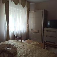 Łóżko lub łóżka w pokoju w obiekcie Balázs Apartman