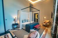 Postel nebo postele na pokoji v ubytování Soho Boutique Castillo de Santa Catalina - Adults Recommended