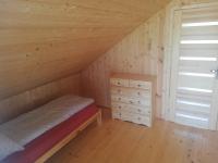 Posteľ alebo postele v izbe v ubytovaní Domek Bażant