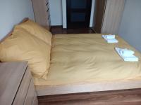 Posteľ alebo postele v izbe v ubytovaní Apartament Mimi