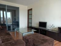 Televízia a/alebo spoločenská miestnosť v ubytovaní Apartament Mimi