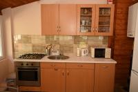 Kuchnia lub aneks kuchenny w obiekcie Pálma Apartman