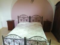 Łóżko lub łóżka w pokoju w obiekcie Agriturismo Tenuta Perruzzi