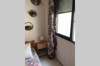 Posteľ alebo postele v izbe v ubytovaní Seablue Relaxing Holiday Apartment
