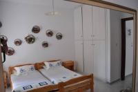 Posteľ alebo postele v izbe v ubytovaní Seablue Relaxing Holiday Apartment