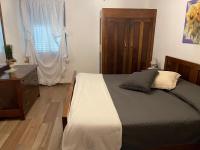 A bed or beds in a room at Casa Paolina - CIPAT 57814