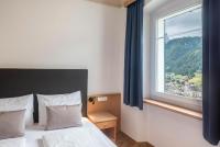 Łóżko lub łóżka w pokoju w obiekcie Villa Martiner Apartments Francesco