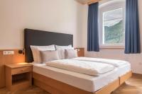Łóżko lub łóżka w pokoju w obiekcie Villa Martiner Apartments Francesco