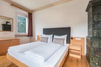 Łóżko lub łóżka w pokoju w obiekcie Villa Martiner Apartments Francesco