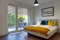Posteľ alebo postele v izbe v ubytovaní Essence Apartments Sapphire