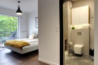 Posteľ alebo postele v izbe v ubytovaní Essence Apartments Sapphire
