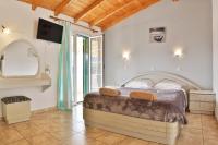 A bed or beds in a room at Fotini Studios