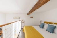 Posteľ alebo postele v izbe v ubytovaní iFlat Yellow Monti Studio Apartment