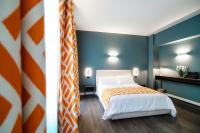 Łóżko lub łóżka w pokoju w obiekcie In Centro Luxury Rooms