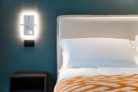 Łóżko lub łóżka w pokoju w obiekcie In Centro Luxury Rooms