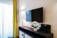 Telewizja i/lub zestaw kina domowego w obiekcie In Centro Luxury Rooms