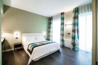Łóżko lub łóżka w pokoju w obiekcie In Centro Luxury Rooms