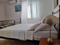 Postel nebo postele na pokoji v ubytování Holiday Apartment 1