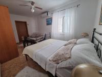 Postel nebo postele na pokoji v ubytování Holiday Apartment 1