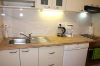 Kuchyň nebo kuchyňský kout v ubytování Apartment Teraferma 2