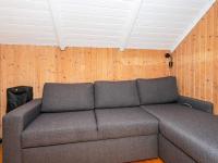 Posezení v ubytování Holiday Home Pøt Strandby IX