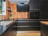 Kuchyň nebo kuchyňský kout v ubytování Holiday Home Pøt Strandby IX