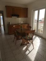 Kuchyň nebo kuchyňský kout v ubytování Anic Apartments Stanići